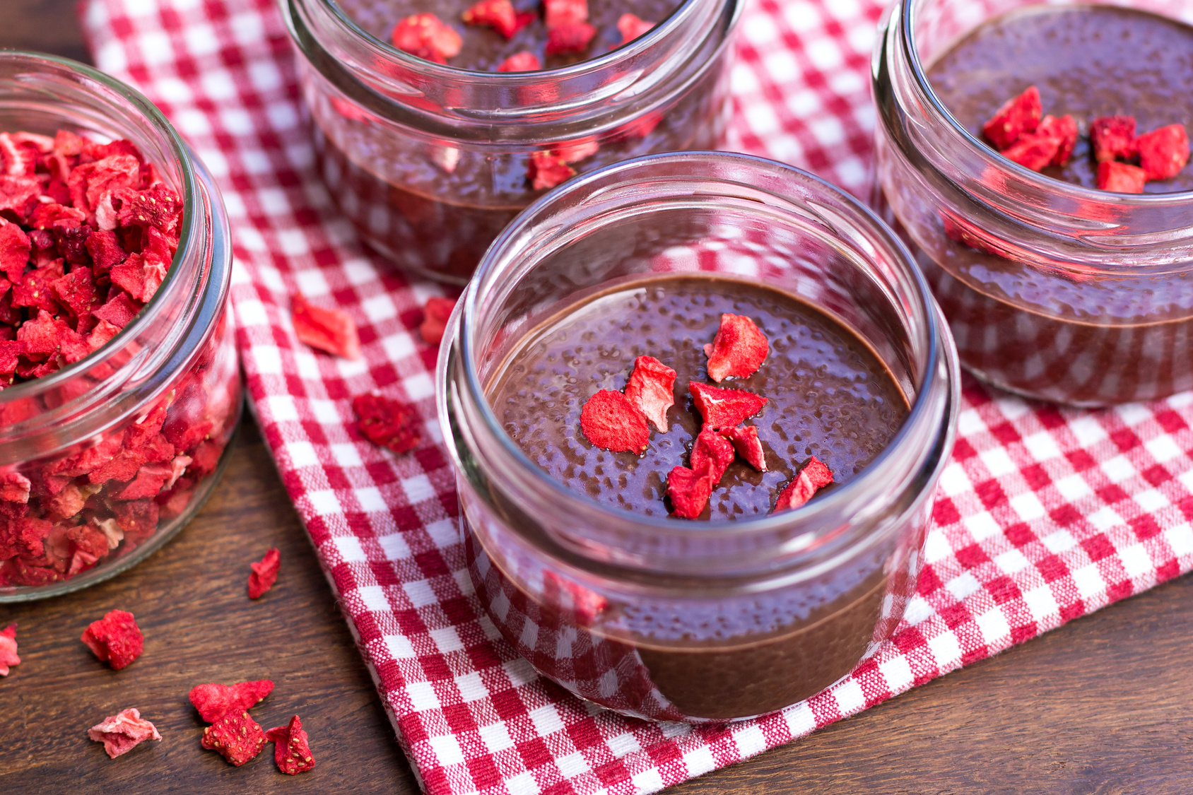 Chocolate chia seed puddings with dried strawberries